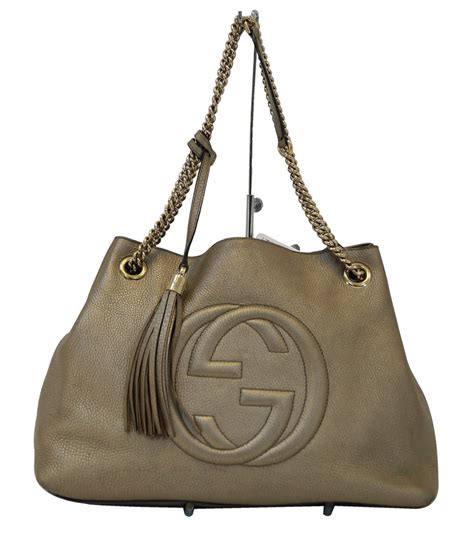 gold purse gucci|Gucci purse with gold chain.